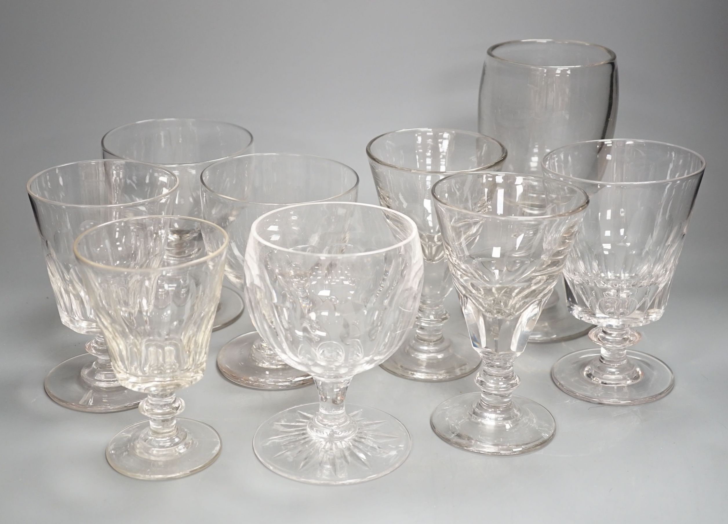 A group of early to mid 19th century glass rummers (9), largest 21cm, smallest 14cm.